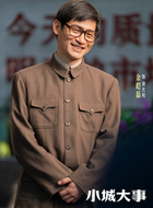 谭光明（余皑磊饰演）