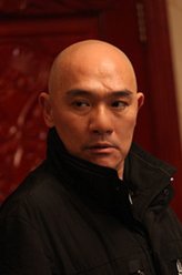 何瑾（王绘春饰演）