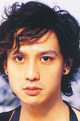 田中隆一（安藤政信饰演）