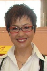 关秀（廖安丽饰演）