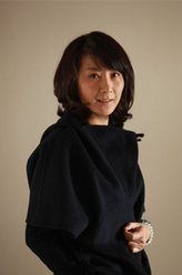 张彩玉（夏力薪饰演）