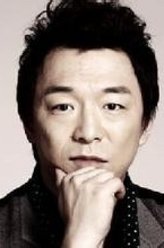 汤文军（黄渤饰演）