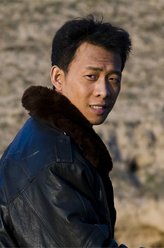 周麦狗（张译饰演）