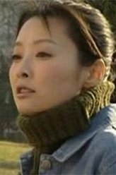 王丽敏（丁嘉丽饰演）