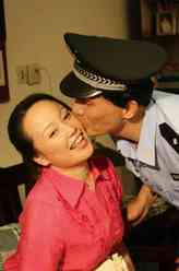 赵文化（张忠明饰演）