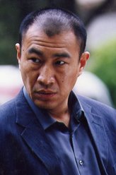 张大炮(张祖德)（石兆琪饰演）