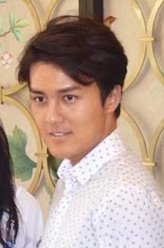李明哲（吴克群饰演）