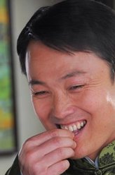 老丁（张新华饰演）