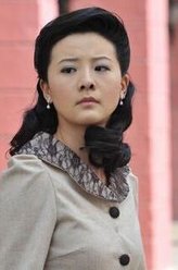 邱曼丽（王馨可饰演）