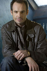 昆汀·兰斯（保罗·布莱克索恩饰演）