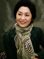 崔女士（金惠玉饰演）